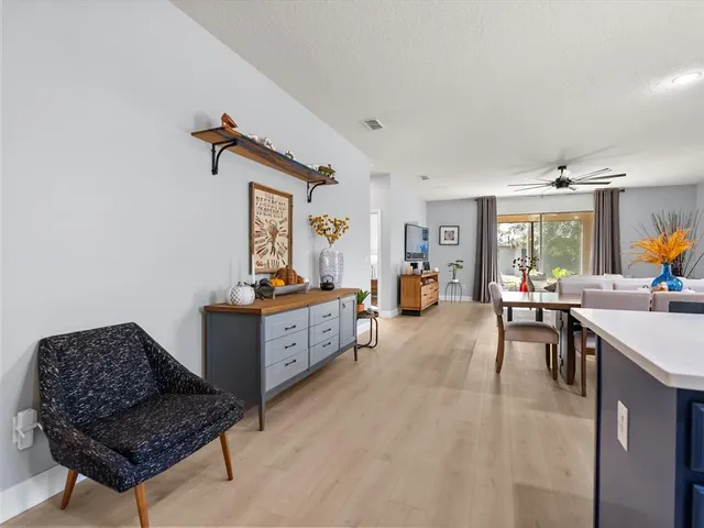 a living room with furniture and a window