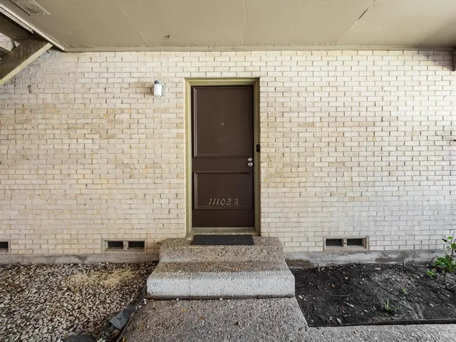 a brick house with a outdoor space