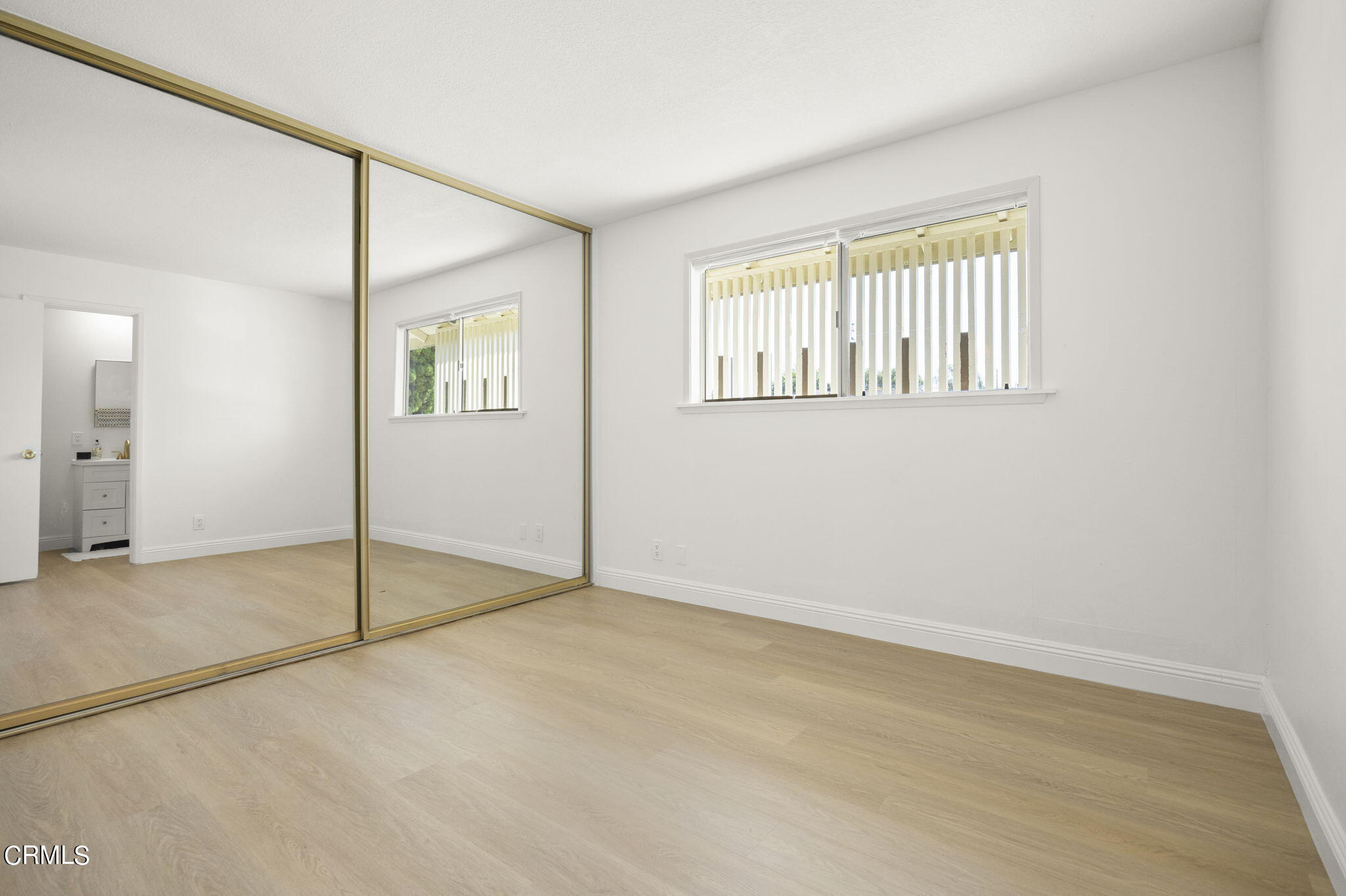 1225 Azalea Street Oxnard, CA 93036 - Photo 15 of 41 an empty room with windows and closet