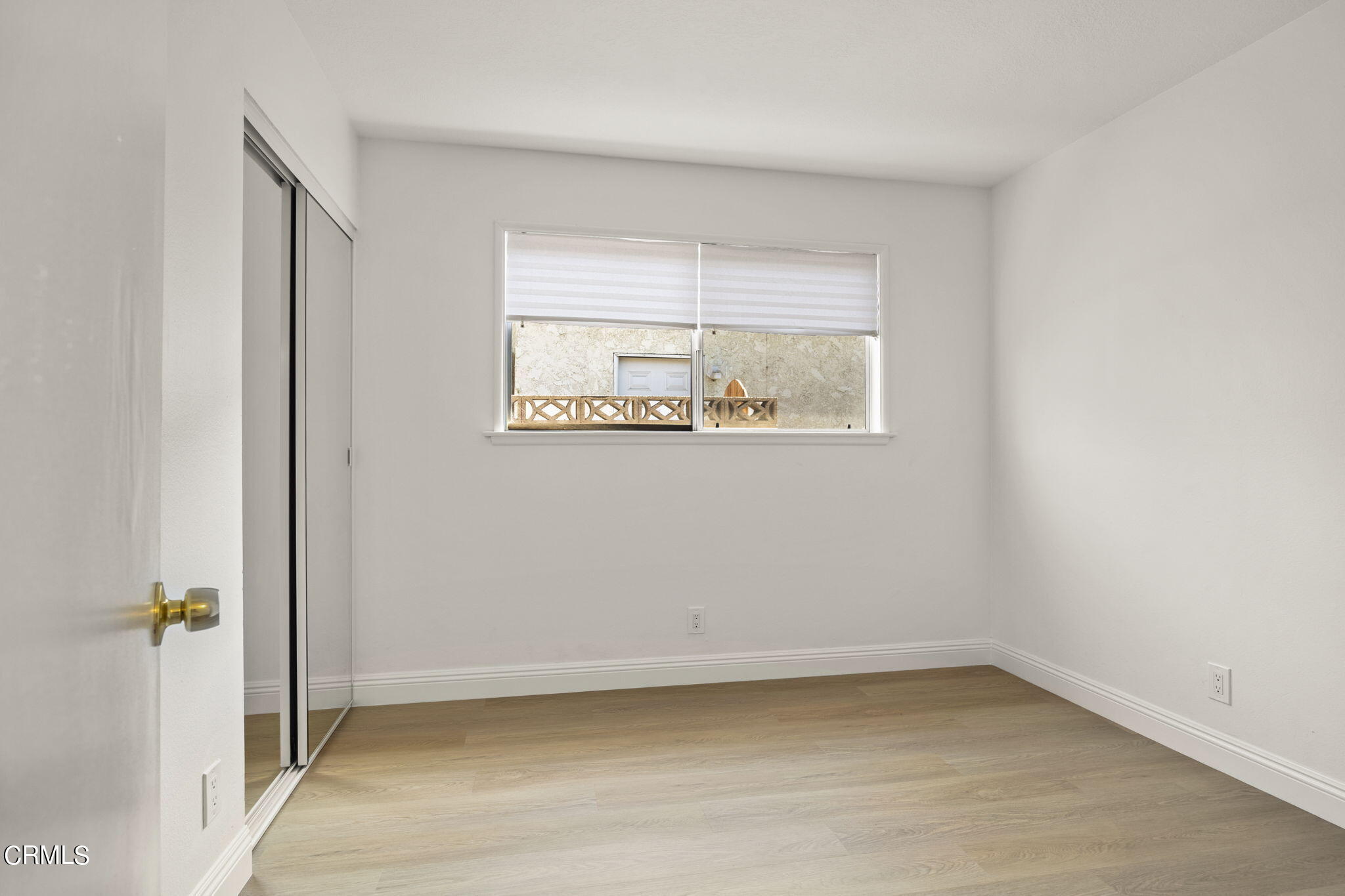 1225 Azalea Street Oxnard, CA 93036 - Photo 22 of 41 an empty room with a window