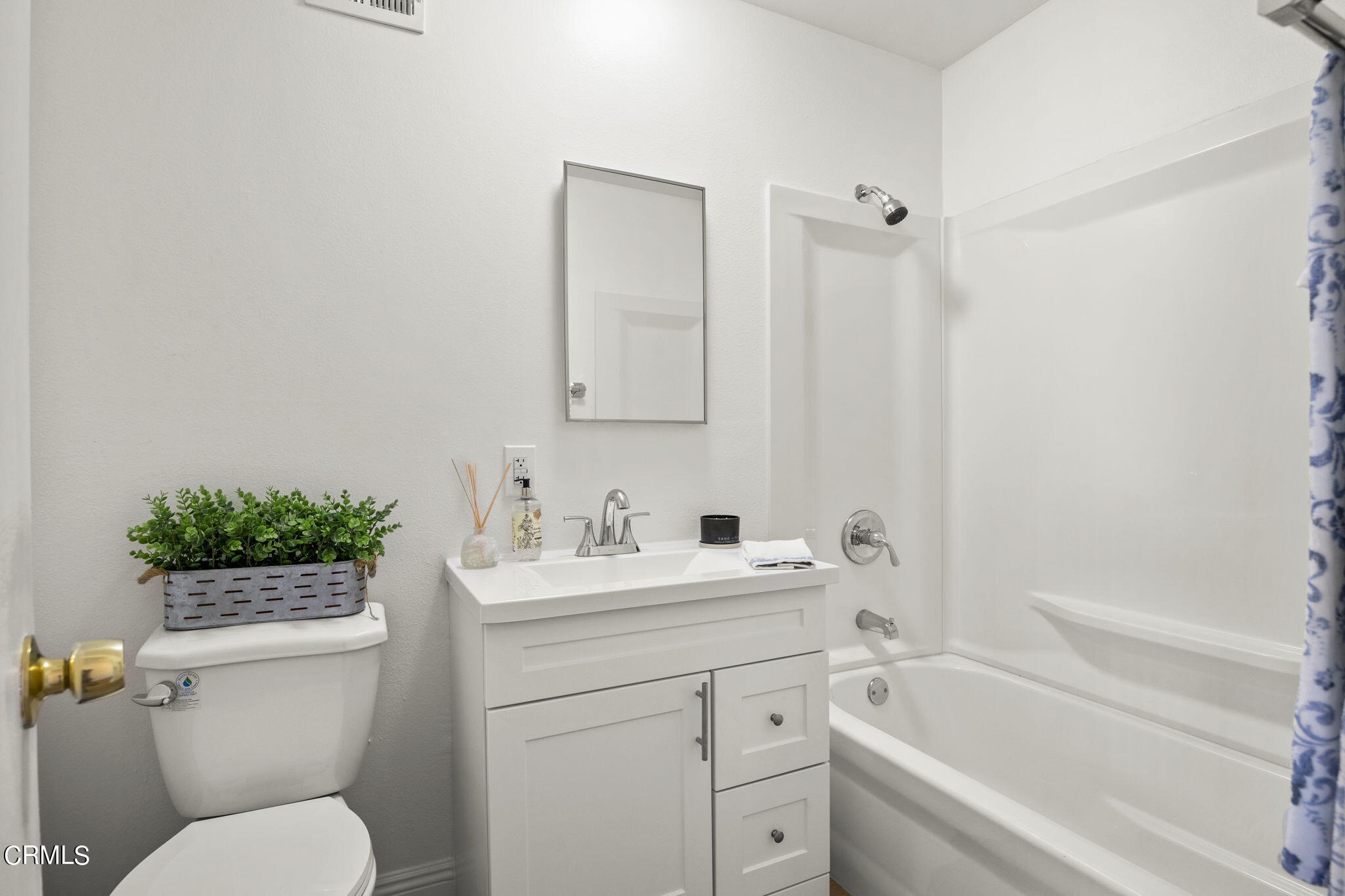 1225 Azalea Street Oxnard, CA 93036 - Photo 23 of 41 a bathroom with a sink toilet vanity granite tub and shower