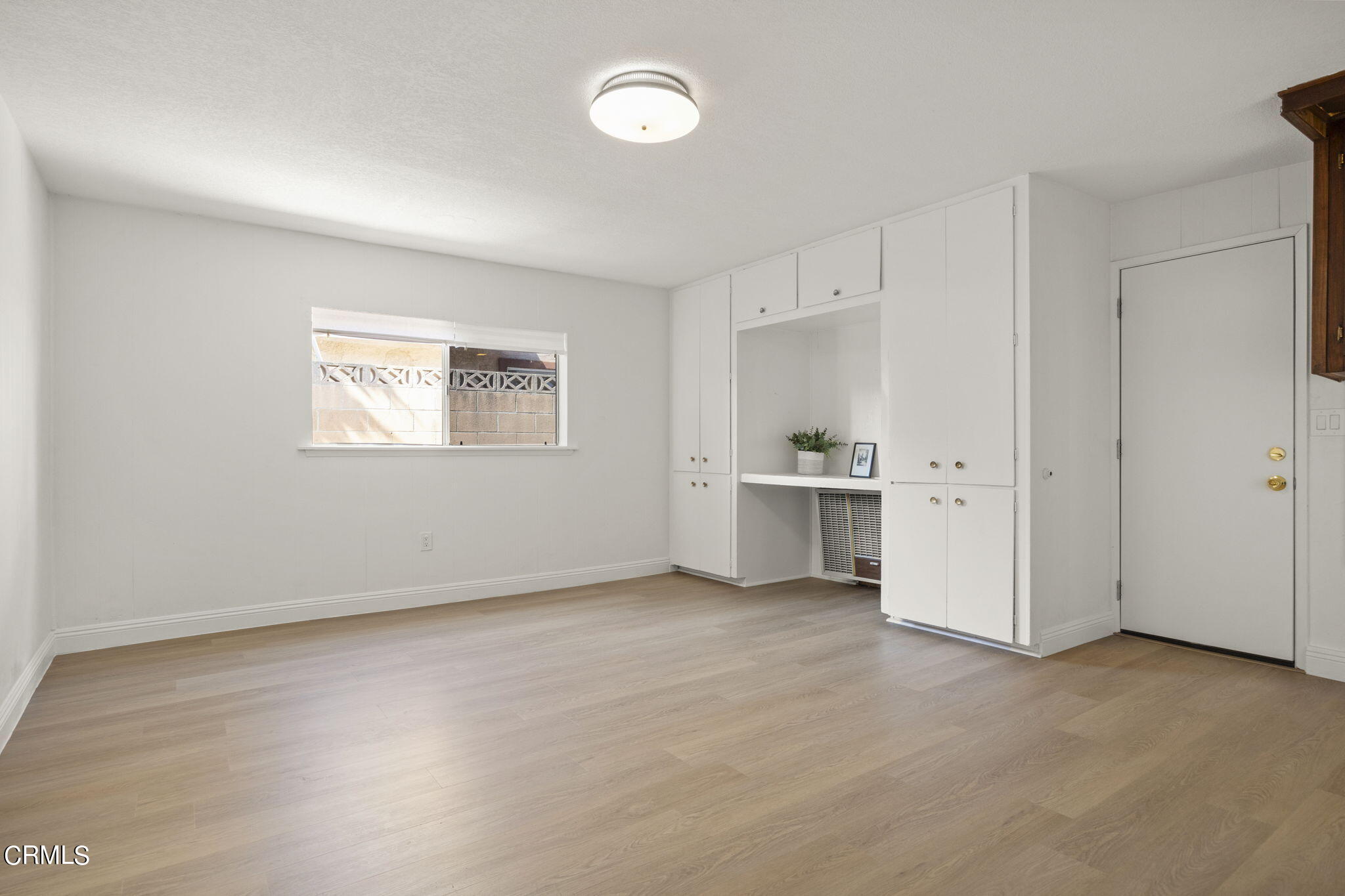 1225 Azalea Street Oxnard, CA 93036 - Photo 26 of 41 a view of a kitchen with a sink and a window