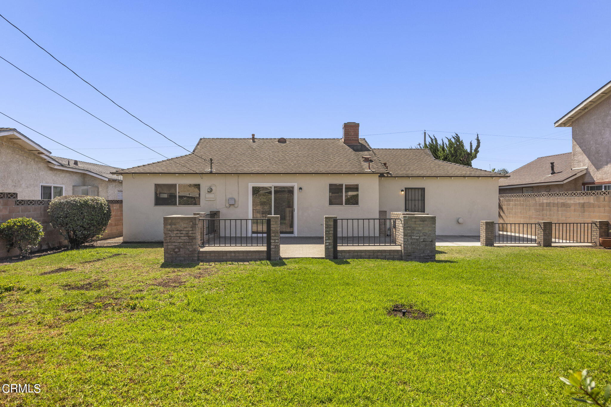 1225 Azalea Street Oxnard, CA 93036 - Photo 33 of 41 a house with swimming pool in front of it
