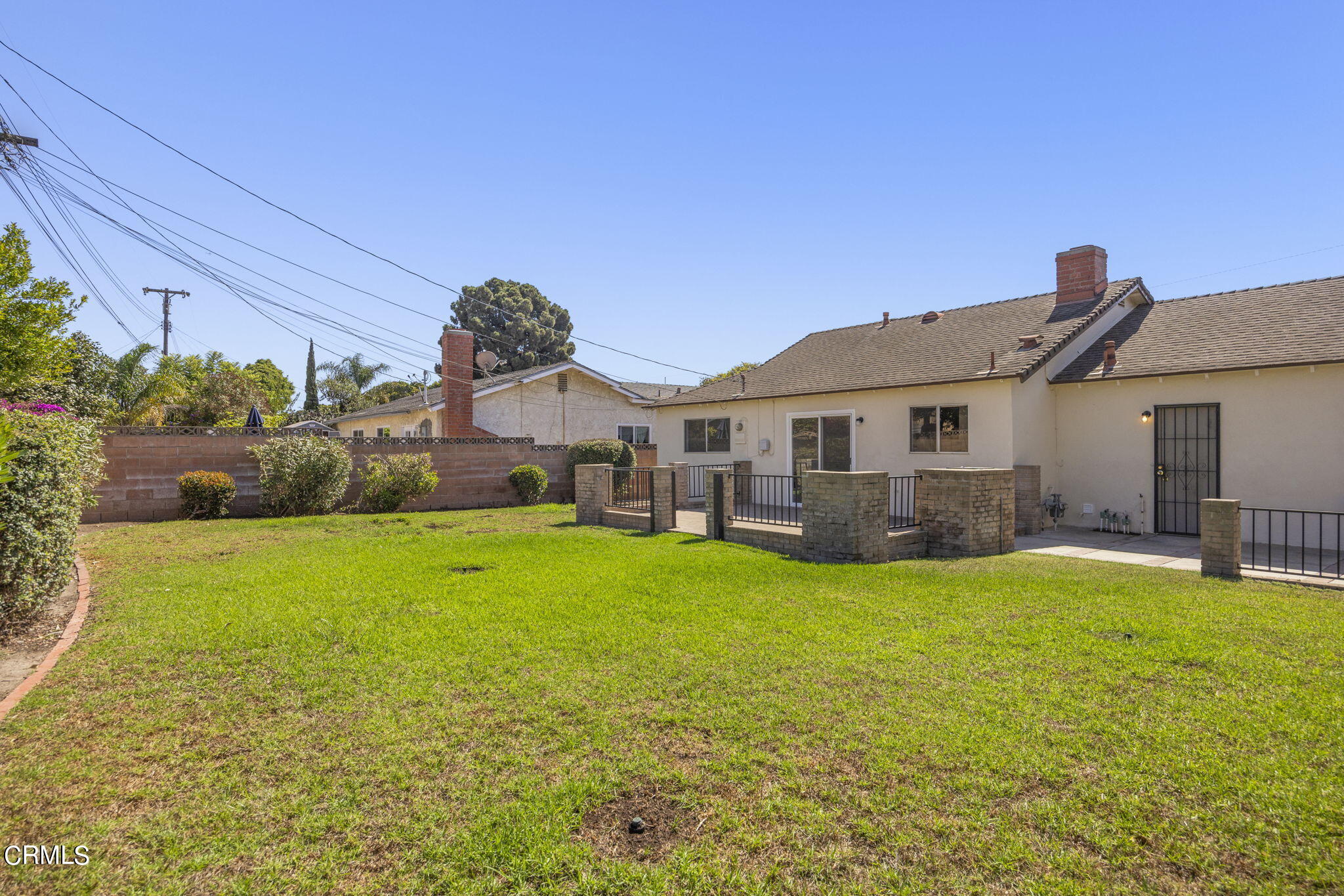 1225 Azalea Street Oxnard, CA 93036 - Photo 34 of 41 a view of a house with a yard