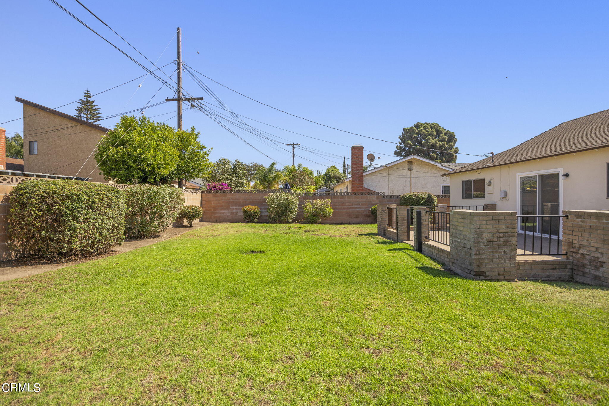 1225 Azalea Street Oxnard, CA 93036 - Photo 35 of 41 a view of a house with a yard
