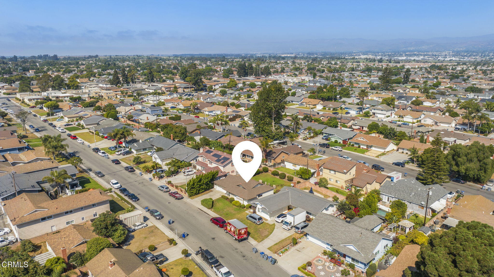 1225 Azalea Street Oxnard, CA 93036 - Photo 41 of 41 an aerial view of residential building with parking space