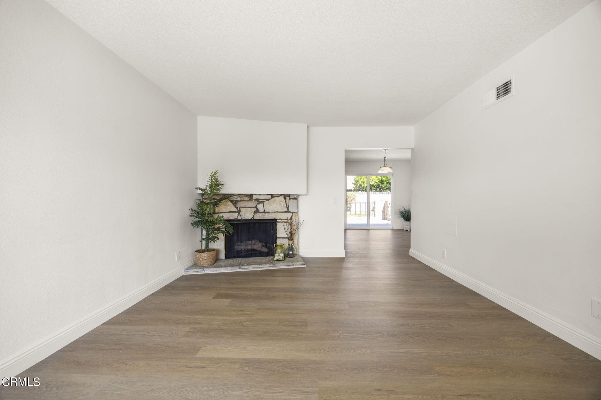 1225 Azalea Street Oxnard, CA 93036 - Photo 5 of 41 a view of an empty room with window and fire place