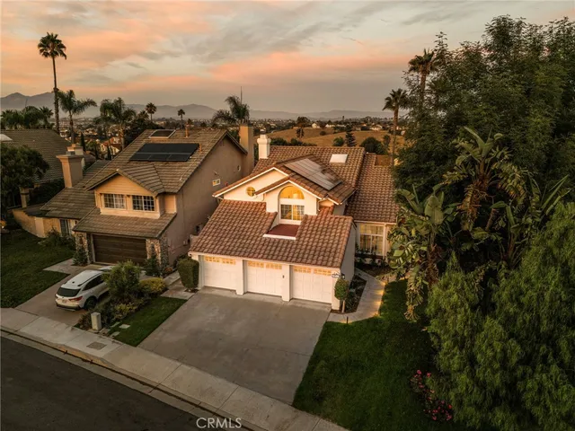 a view of a houses with a city view