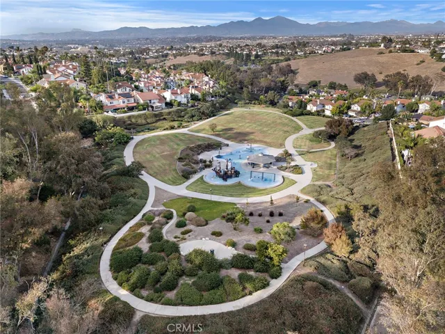 an aerial view of a house with a lake view