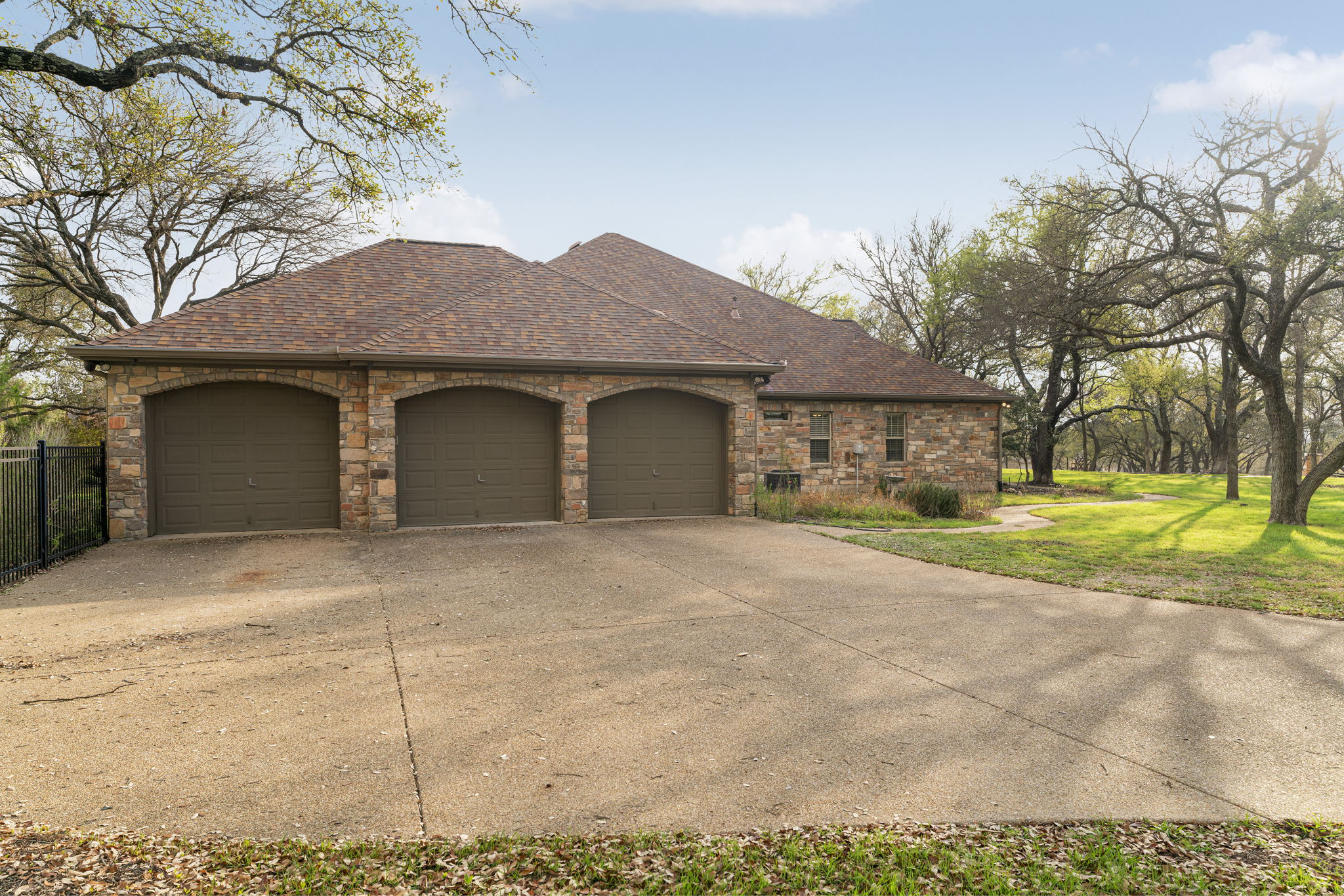 301 Goldridge Drive Georgetown, TX 78633 - Photo 35 of 40 a front view of a house with a yard and garage