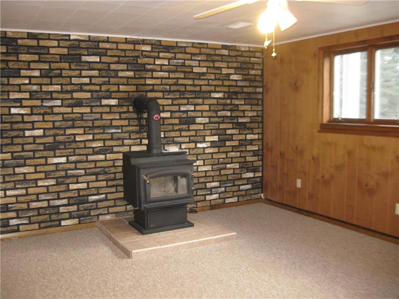 628 Unionville Road Butler, PA 16001 - Photo 6 of 21 Lower level family room with wood stove included.