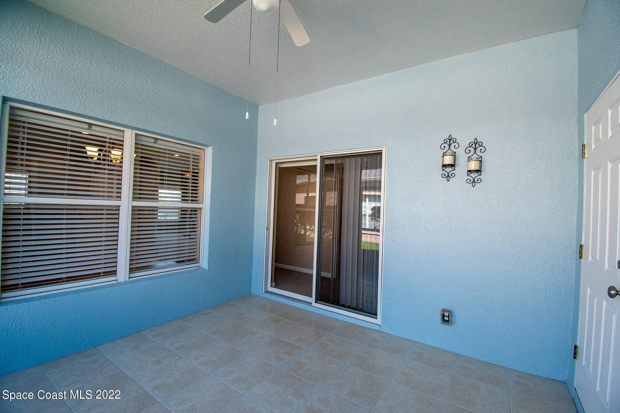4165 Alamanda Key Drive Melbourne, FL 32901 - Photo 19 of 38 a view of an empty room with a window