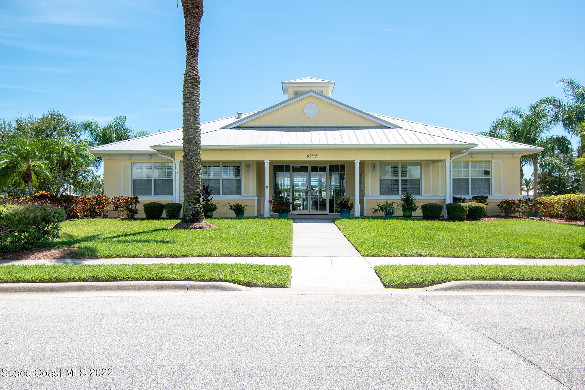4165 Alamanda Key Drive Melbourne, FL 32901 - Photo 31 of 38 a front view of a house with a yard