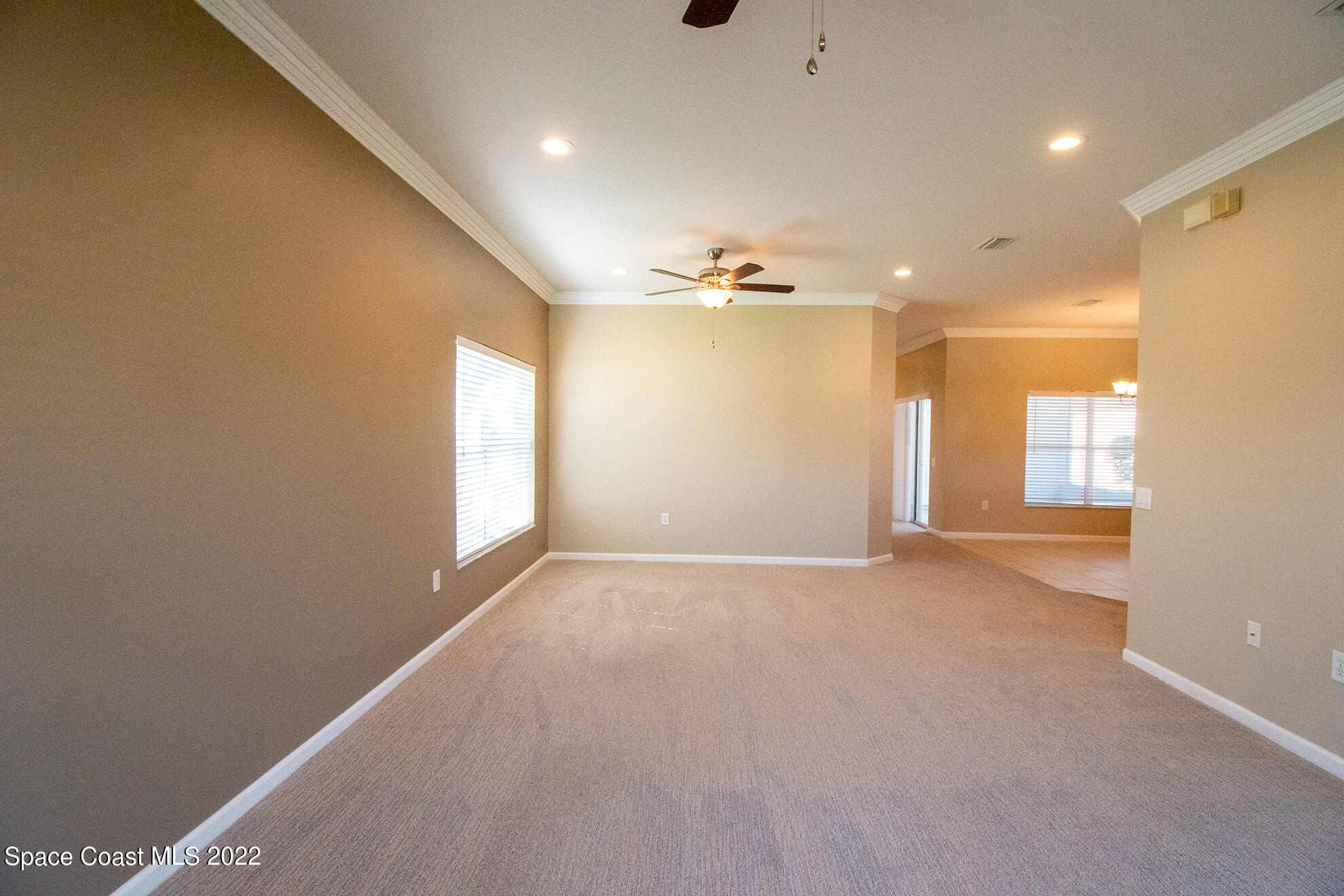 4165 Alamanda Key Drive Melbourne, FL 32901 - Photo 9 of 38 a view of an empty room with a window