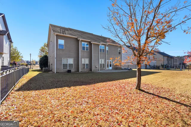 a view of a backyard of a house