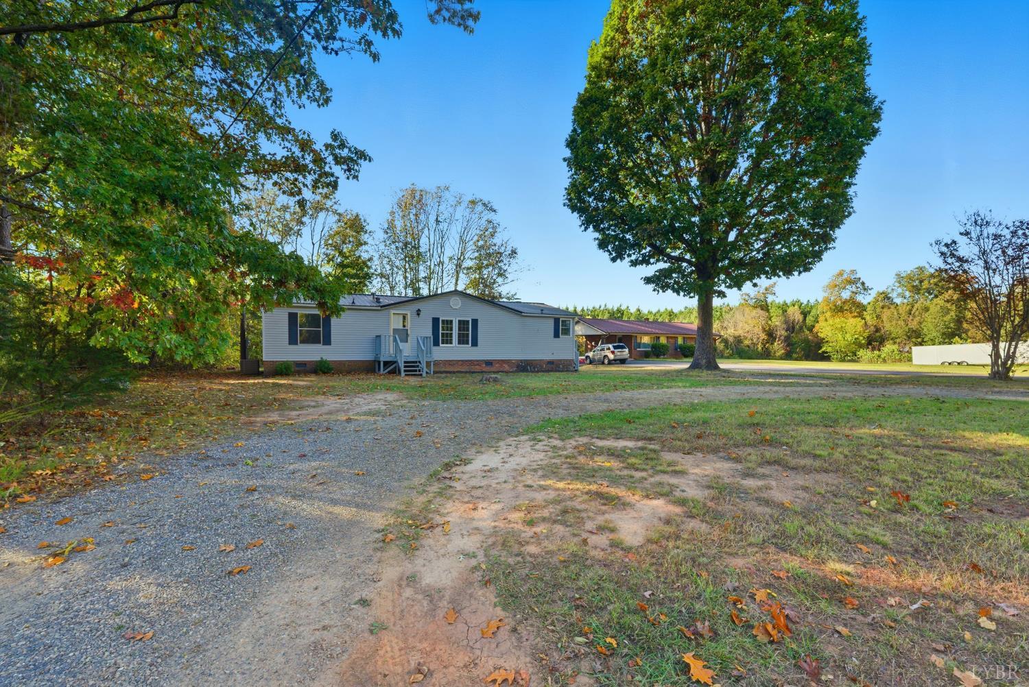 2213 Rabat Road Nathalie, VA 24577 - Photo 26 of 40 a view of a house with a yard