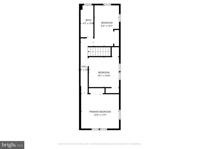 a picture of a bench in front of a wall