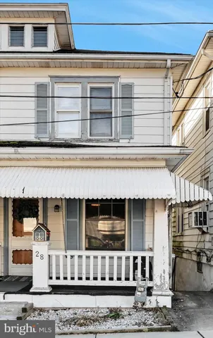 a kitchen with a stove and cabinets