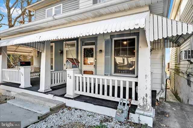 front view of a house with a porch