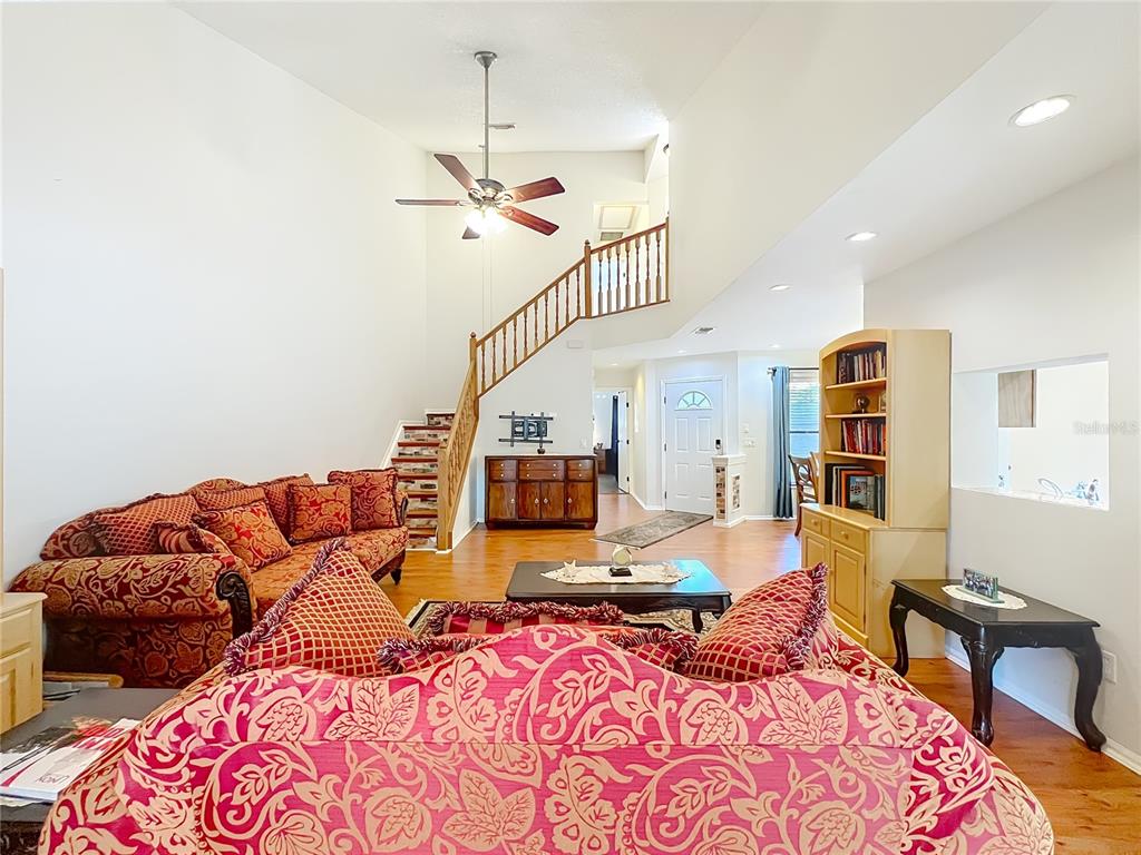 709 Lighthouse Court Altamonte Springs, FL 32714 - Photo 11 of 51 a bedroom with furniture and a wooden floor