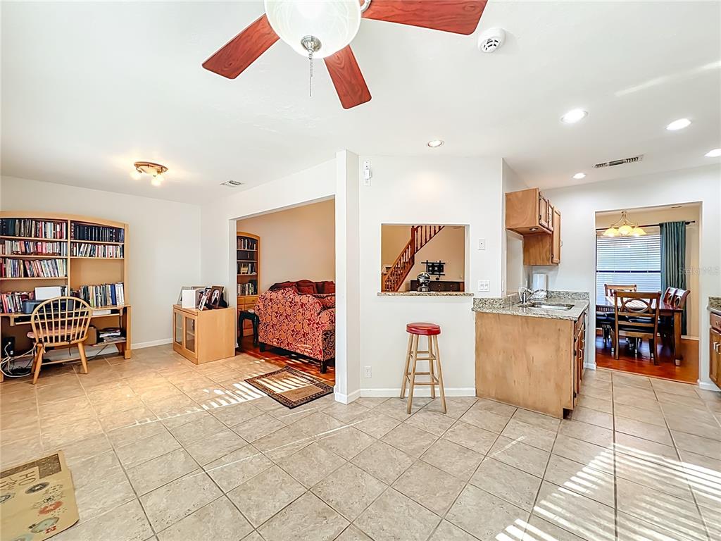 709 Lighthouse Court Altamonte Springs, FL 32714 - Photo 18 of 51 a living room with furniture and a flat screen tv