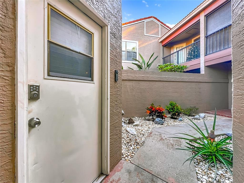 709 Lighthouse Court Altamonte Springs, FL 32714 - Photo 2 of 51 a vase of flowers sitting on a floor