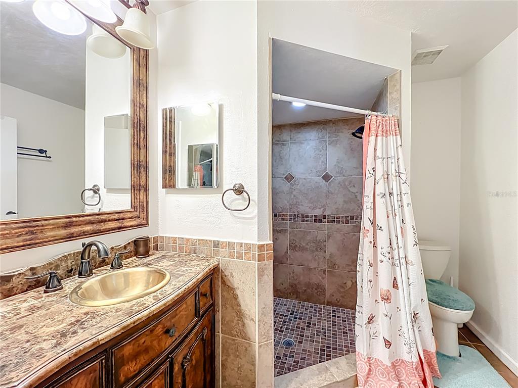 709 Lighthouse Court Altamonte Springs, FL 32714 - Photo 31 of 51 a bathroom with a sink and a mirror