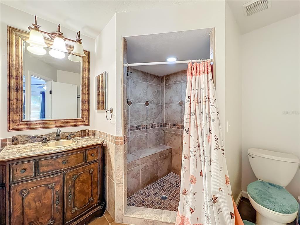 709 Lighthouse Court Altamonte Springs, FL 32714 - Photo 33 of 51 a bathroom with a sink a toilet and shower