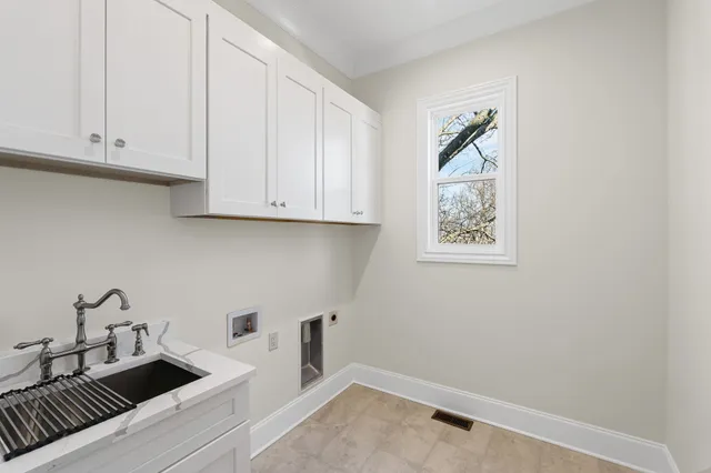 a bathroom with a granite countertop sink mirror and shower