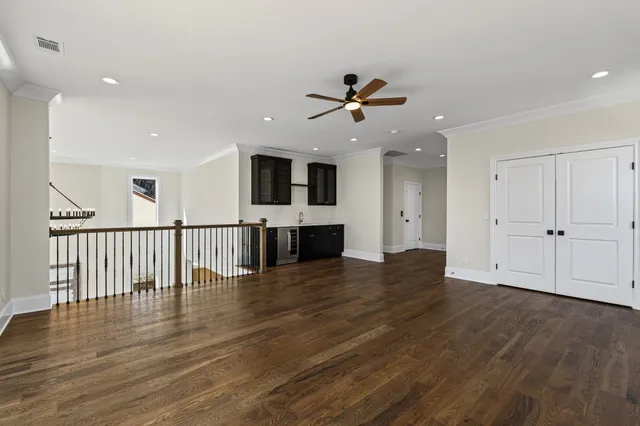 a bathroom with a sink toilet a mirror and shower