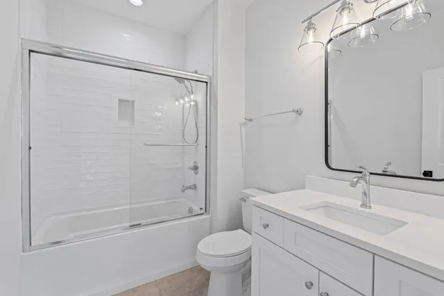 a view of a parking space in front of a house