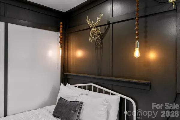 a bathroom with a shower and a mirror