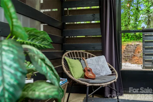 a view of a chairs in a balcony