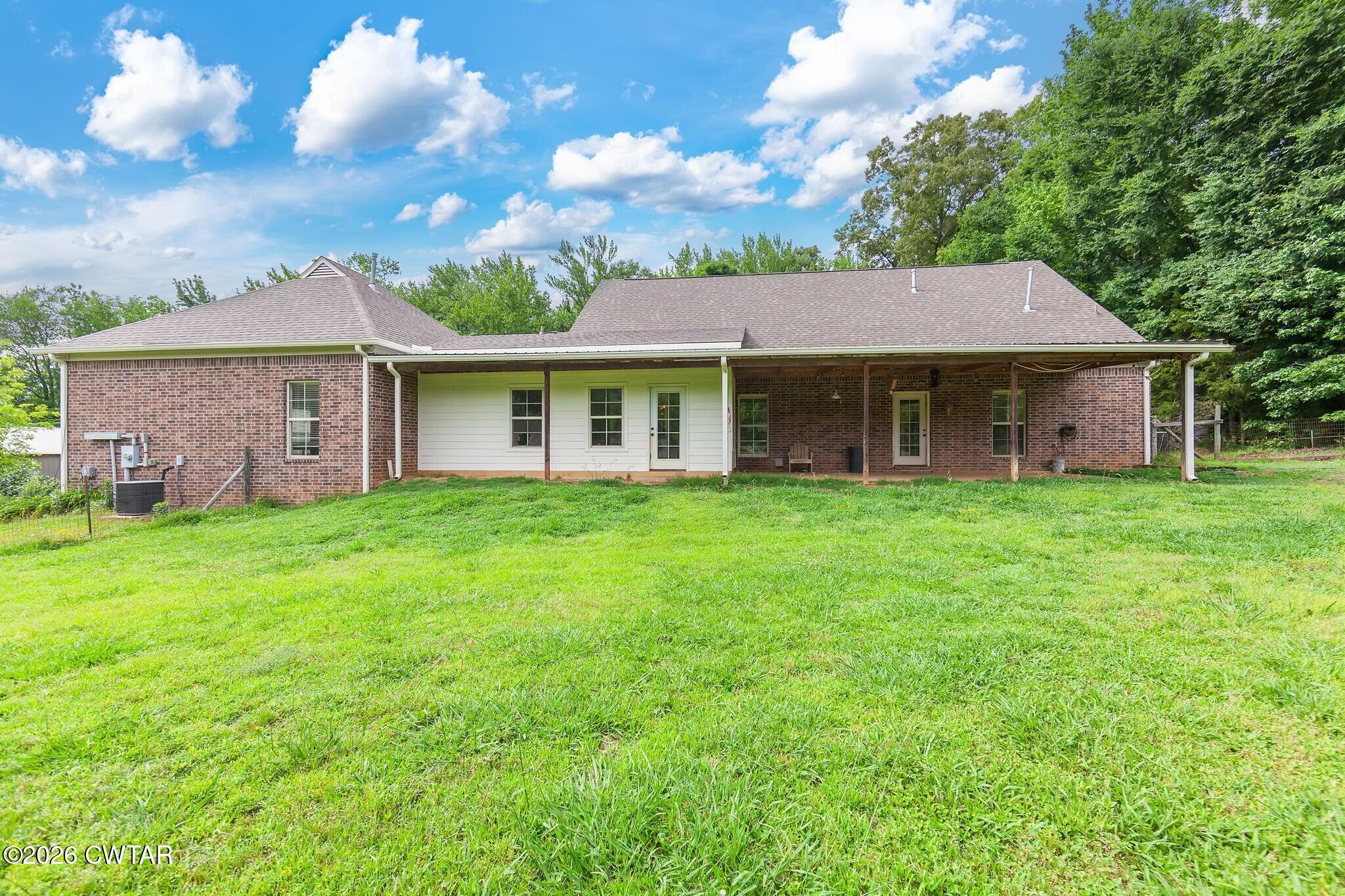 4080 Beech Bluff Road Beech Bluff, TN 38313 - Photo 3 of 41 a front view of house with yard and green space