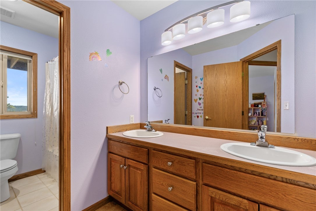 304 Pine Crest Road Columbus, MT 59019 - Photo 17 of 33 full bathroom next to bedroom 2 & 3