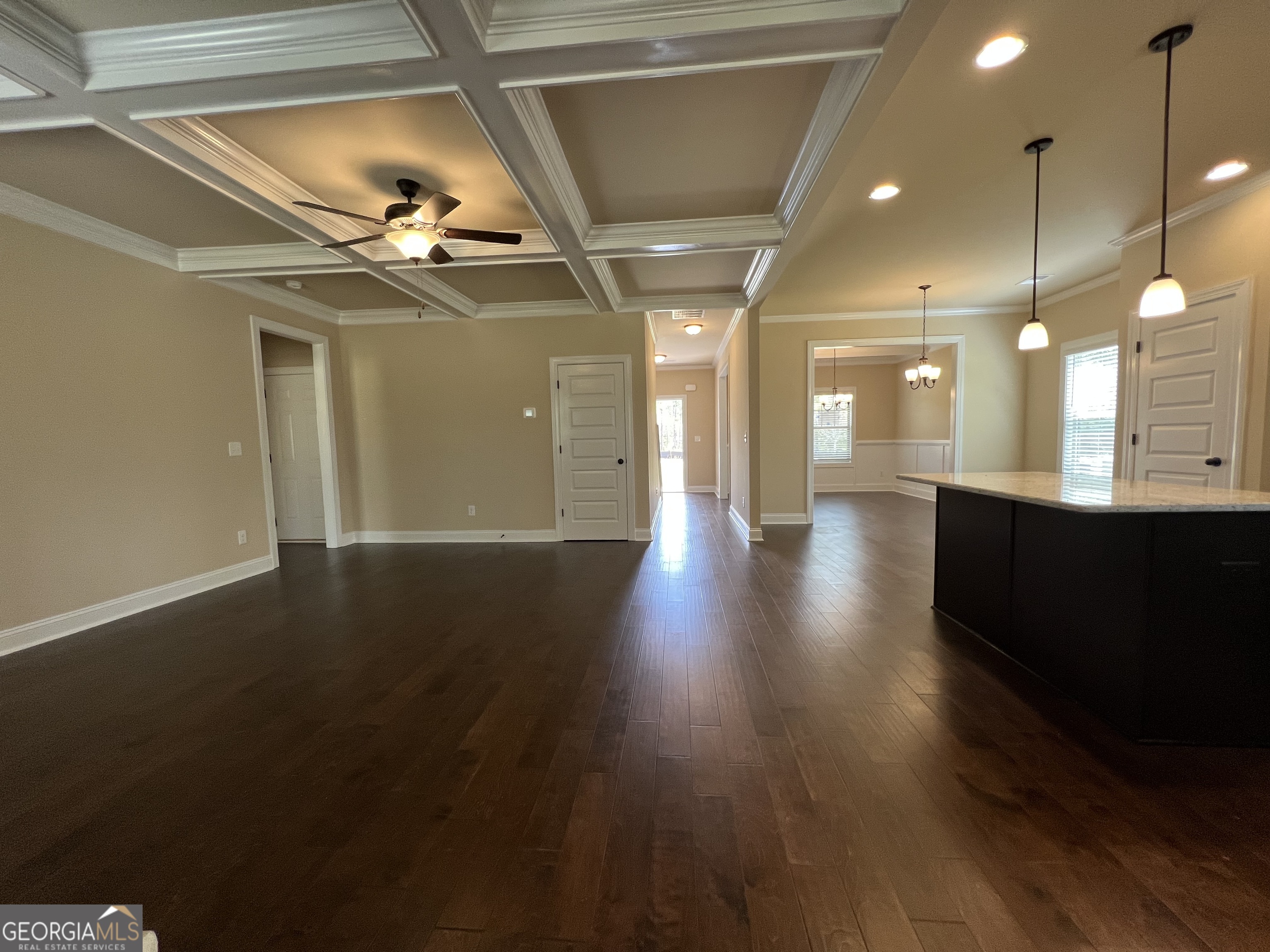 341 Homestead Circle Forsyth, GA 31029 - Photo 14 of 38 a view of lobby with a ceiling fan and wooden floor