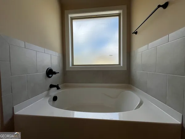 a bathroom with a bathtub