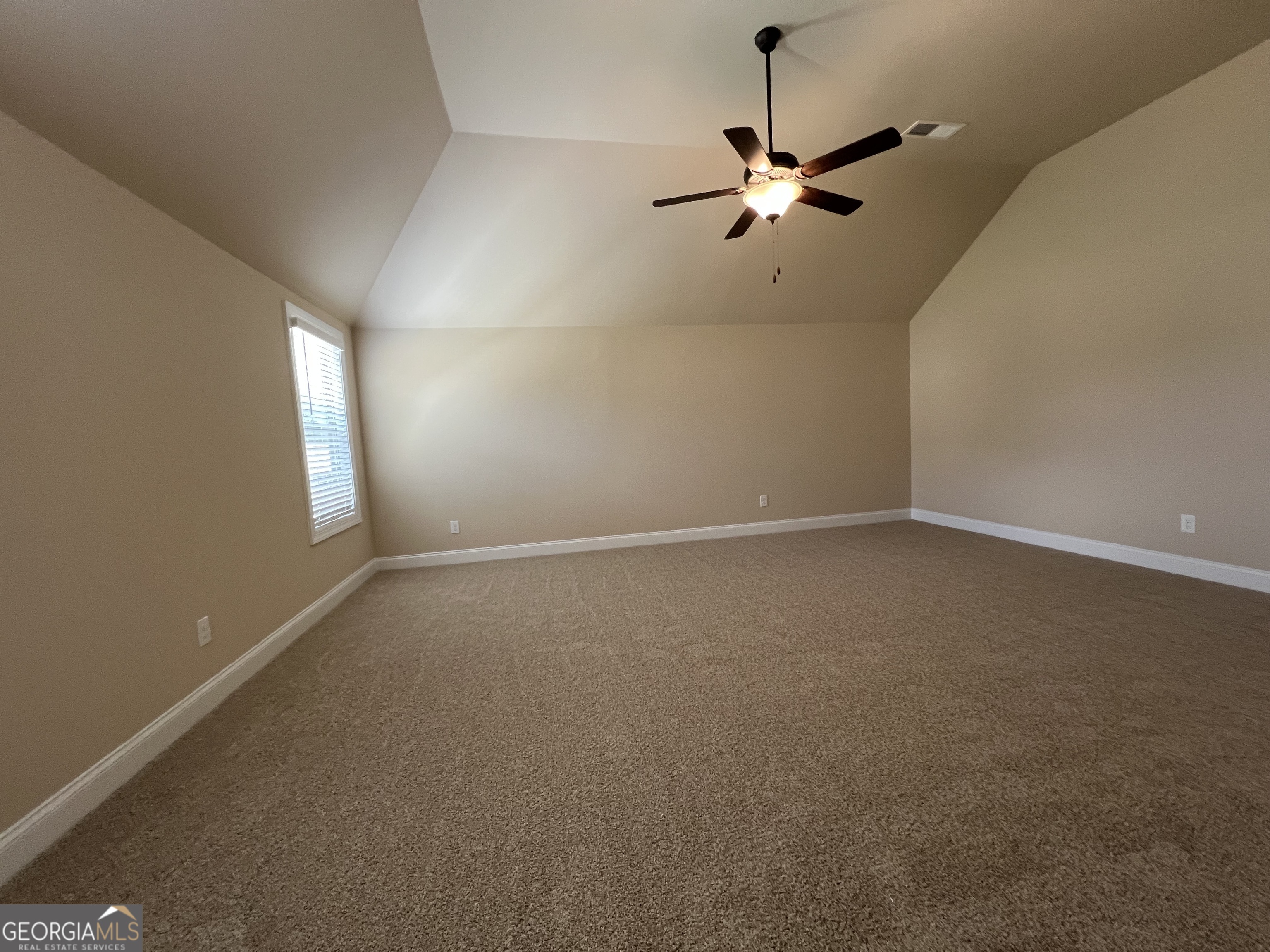 341 Homestead Circle Forsyth, GA 31029 - Photo 27 of 38 an empty room