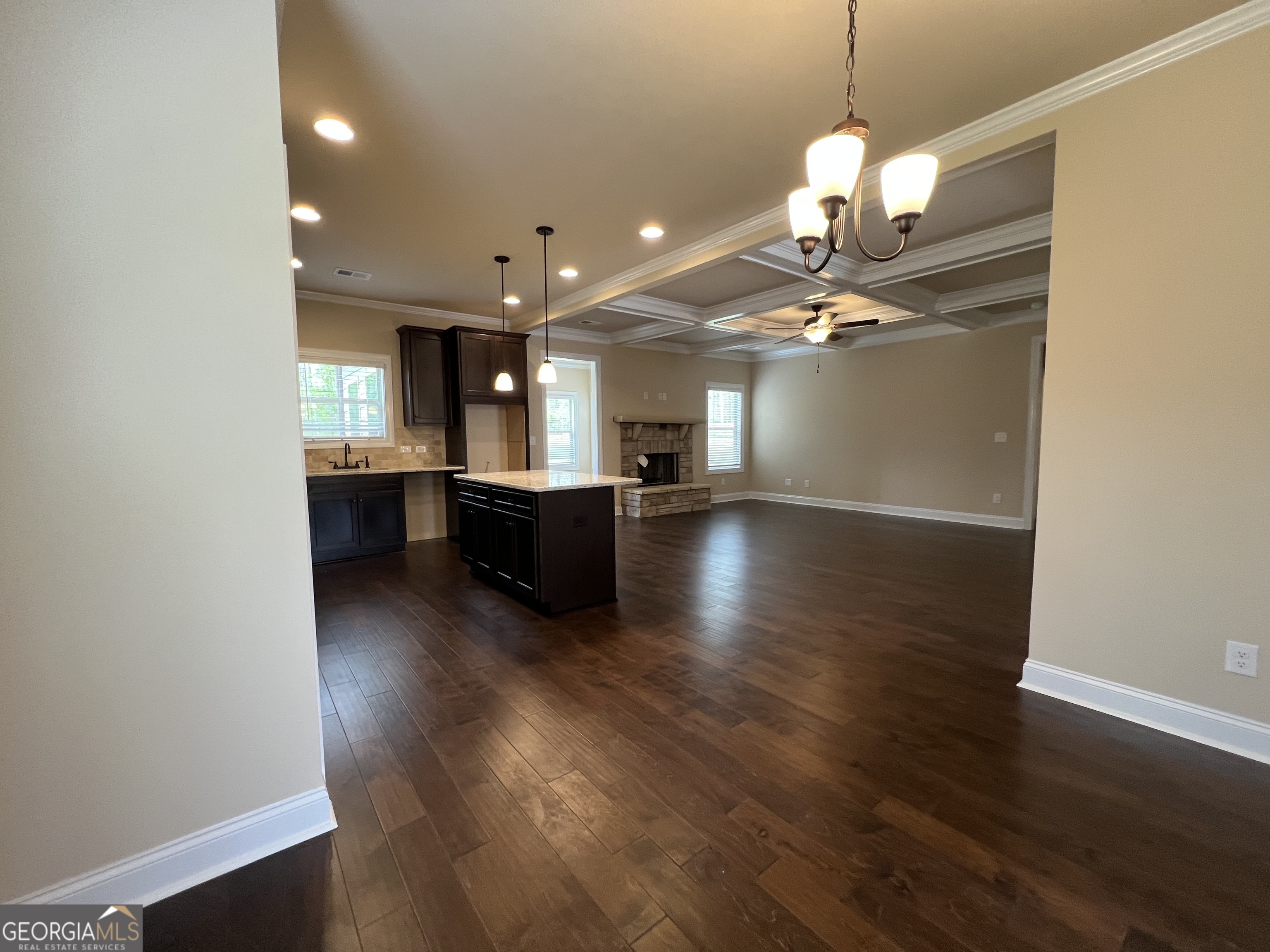 341 Homestead Circle Forsyth, GA 31029 - Photo 7 of 38 a view of a kitchen with sink and wooden floor