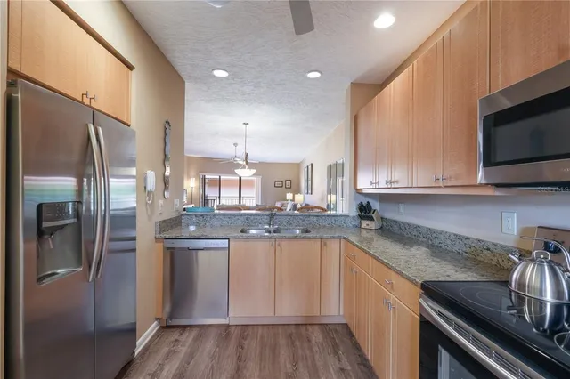 a view of pool with outdoor seating