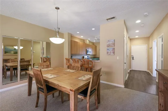 a view of a dining room and livingroom