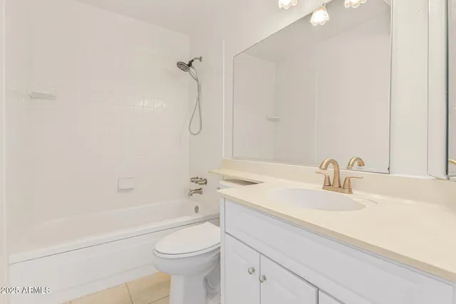 a view of a storage and utility room with washer and dryer