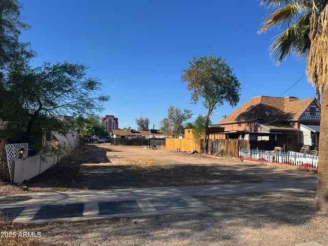 a view of a street with houses