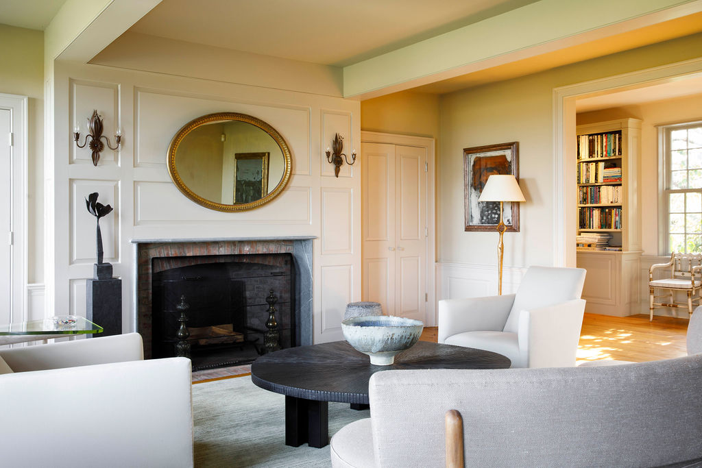 35 Shawkemo Road Nantucket, MA 02554 - Photo 17 of 53 a living room with couches a fireplace and a fireplace with wooden floor