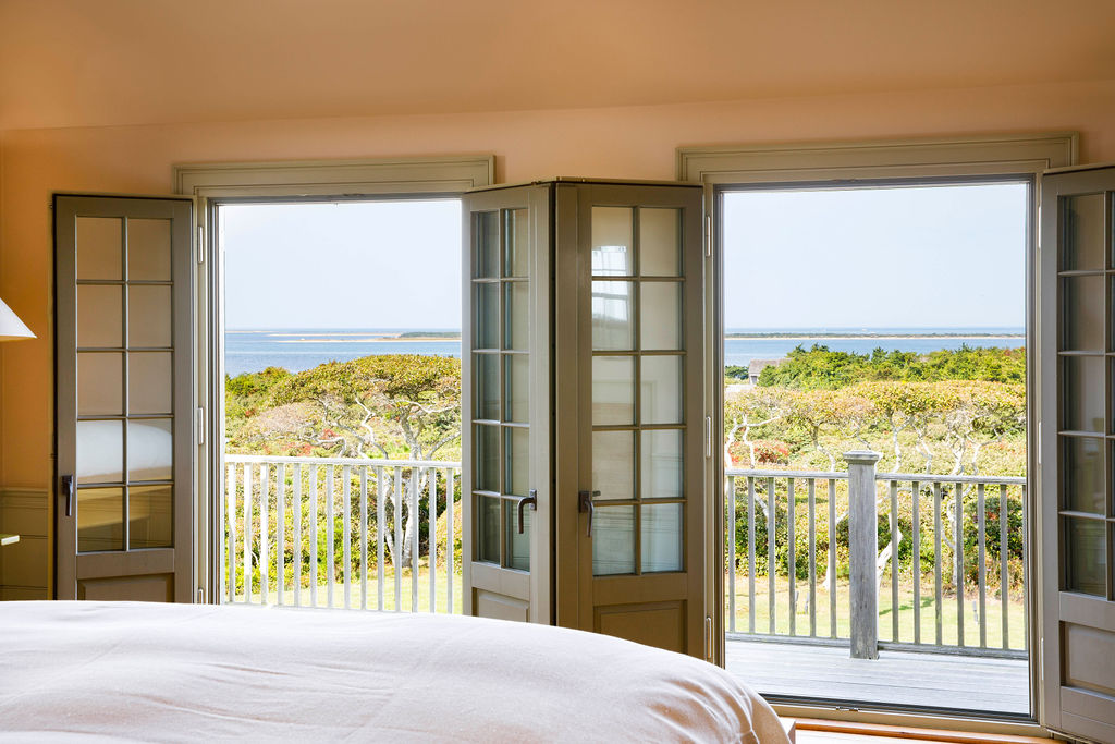 35 Shawkemo Road Nantucket, MA 02554 - Photo 31 of 53 a bedroom with a bed and a window