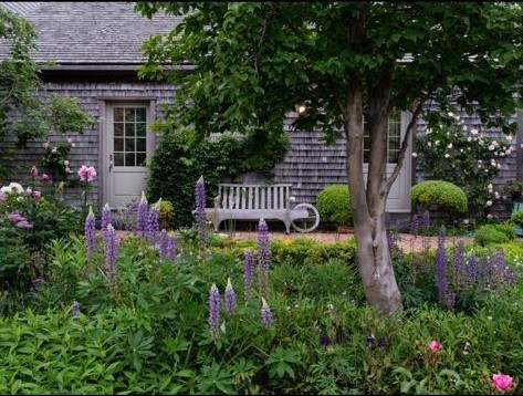 35 Shawkemo Road Nantucket, MA 02554 - Photo 53 of 53 a view of a house with a flower garden