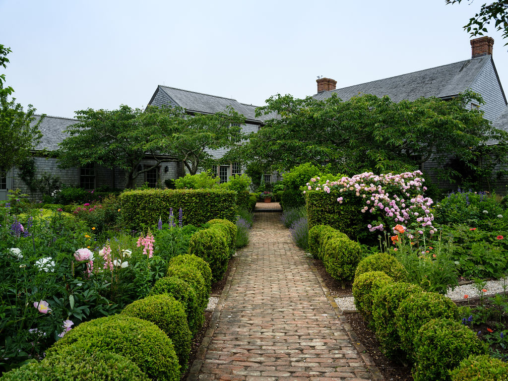 35 Shawkemo Road Nantucket, MA 02554 - Photo 7 of 53 a view of a garden with a pathway