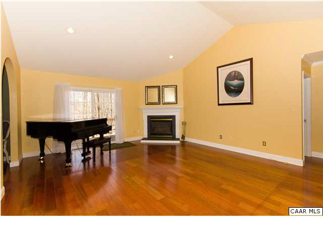 66 Amethyst Road Palmyra, VA 22963 - Photo 5 of 30 a living room with furniture and a fireplace
