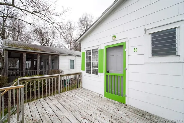 a view of a house with a deck