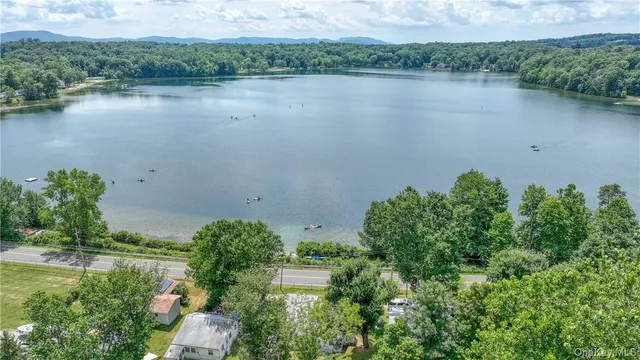 a view of a lake with a mountain in the background